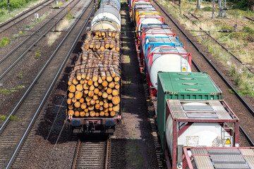 Above view of railway sorting station with many lines directions in Germany. Railroad car wooden...