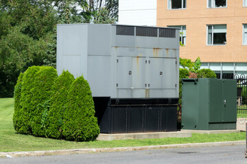 Fototapeta na wymiar A big backup generator near an hospital