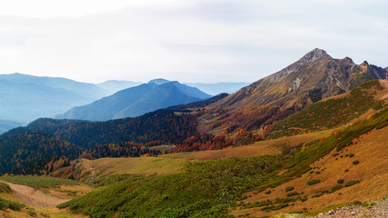 Beautiful panorama of mountains, freedom and beauty of nature. Autumn view of the Caucasus mountains in Russia