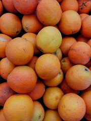 Close up Oranges. Sells in supermarket, dark background, selective blurred focus