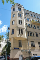 A HOUSE ON THE CORNER OF BOLSHOY KOZIKHINSKY LANE IN MOSCOW. TRANSLATION OF THE TEXT ON THE CORNER OF THE HOUSE - " BOLSHOY KOZIKHINSKY LANE "