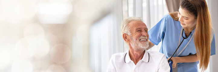 Web banner Man being cared for by a private Asian nurse at home suffering from Alzheimer's disease to closely care for elderly patients with copy space on left - obrazy, fototapety, plakaty