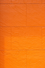 オレンジ色の壁の背景素材