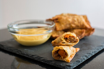 Tequenos filled fried dough fast food Peruvian snack restaurant mise en place