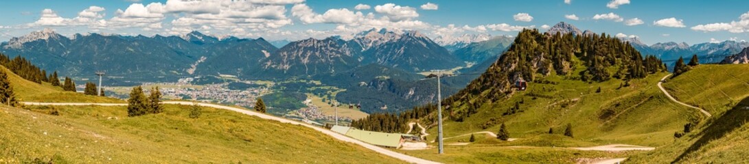 Fototapeta na wymiar High resolution stitched alpine panorama at the famous Hahnenkamm summit, Reutte, Tyrol, Austria