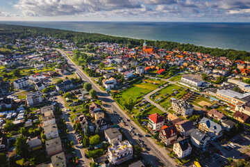 Summer view from the air of the Hel Peninsula, a calm and nice landscape over Jastarnia village.