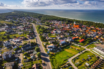 Summer view from the air of the Hel Peninsula, a calm and nice landscape over Jastarnia village.