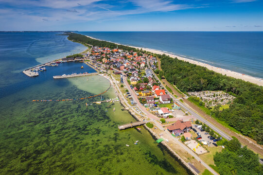 Summer view from the air of the Hel Peninsula, a calm and nice landscape over Chalupy village.