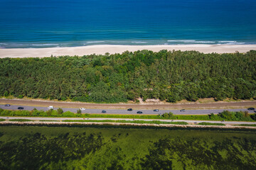 Summer view from the air of the Hel Peninsula, a calm and nice landscape over Jurata village.