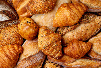 Bread and croissant top view, lots of baked goods