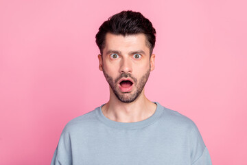 Portrait of shocked speechless person open mouth cant believe staring isolated on pink color background