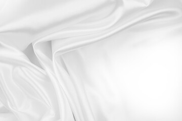 Fototapeta na wymiar Rippled white silk fabric. Copy space