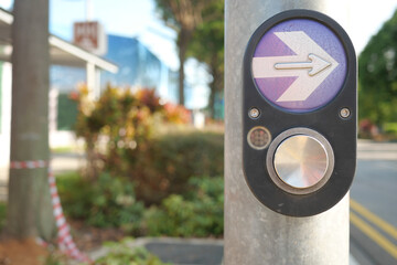 close up of crossing signal button in singapore 