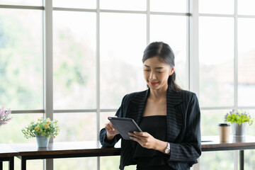 Young businesswoman working in the office. Asian young businesswoman at office work