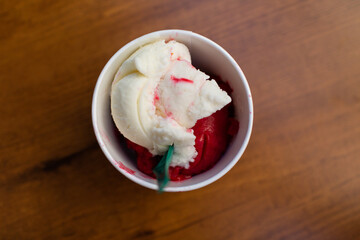 Dondurma colorful ice cream in a cup on table top view.