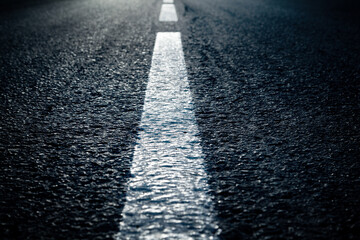 Dividing lane on the road close-up