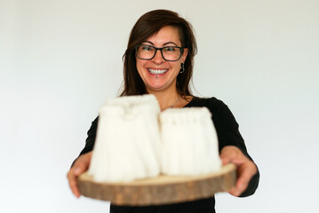 Young Woman Hanging A Macrame Project