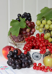 Fresh summer fruit and berry on a table. Natural antioxidants. Healthy eating concept. 