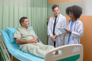 Caucasian doctor is examining and consulting to senior patient in hospital.