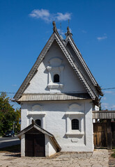 Fototapeta na wymiar Suzdal, Vladimir Region, Russia - August, 18, 2022: an old white-stone manor house in the old town on a sunny summer day