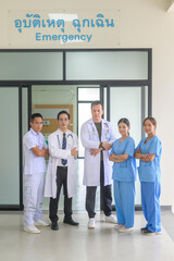 An Asian professional confidence medic team are walking  in hospital, health care concept .