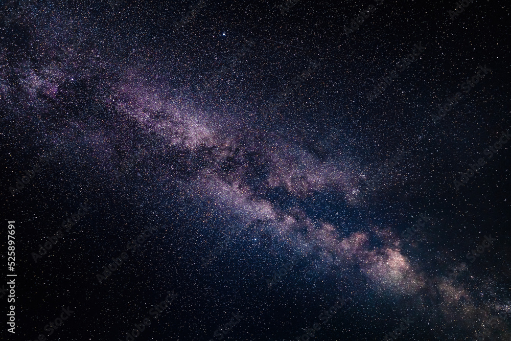Wall mural milky way in the night sky