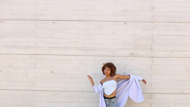 girl dancing in the street half body with copy-space