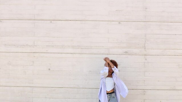 girl dancing in the street half body with copy-space