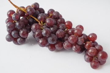 bunch of seedless grapes or Grape seed roe.