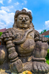 Fototapeta premium Big statue of Dwarapala, a gate-keeping giant in massive size used to be facing the east towards Singasari temple, Malang, East Java, Indonesia.