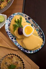 Papa a la huancaina sauce boiled potatoes peruvian food entree dish