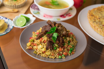 Green rice with meat Buffet table peruvian food gourmet restaurant
