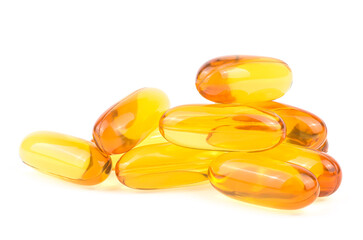 Fish oil capsules isolated on a white background. Cod liver oil omega 3 gel capsules. - obrazy, fototapety, plakaty
