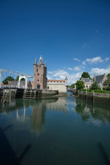 Fototapeta na wymiar Medieval town Zierikzee in the province Zeeland in The Netherlands with it scenic old Dutch bridges and buildings is a favorite tourist destination for many Europeans