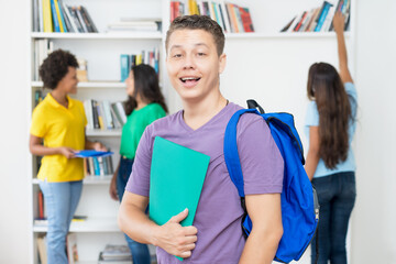 Young german male student with group of students