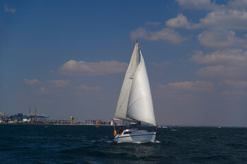 Fototapeta premium Sailing yacht regatta. Sailboats under sail in the race. Yachting. Luxury yachts.