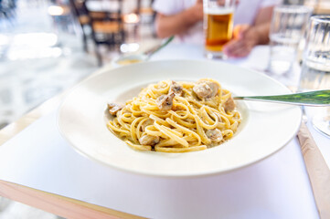 Creamy mushroom Spaghetti pasta, Vegan option, served in restaurant