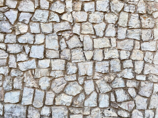 Texture of a stone wall. Old stone wall texture background