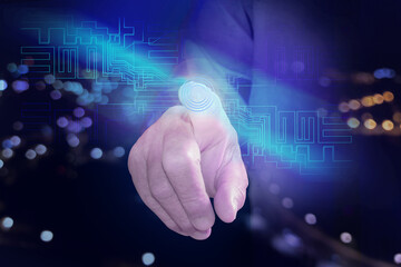 Finger points to the microcircuit. new technologies concept