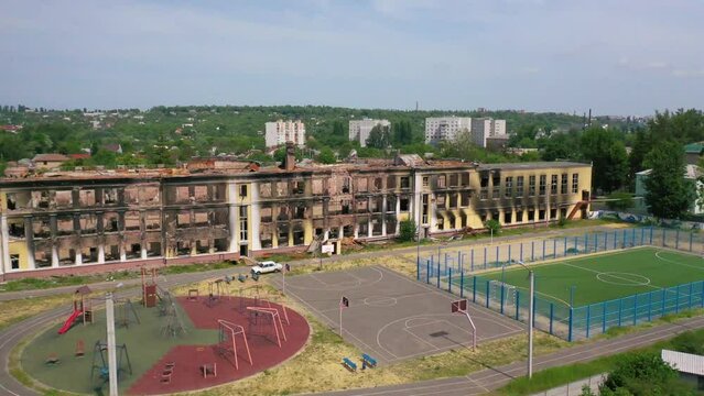 2022 - very good aerial of a once beautiful school building completely destroyed by Russian rockets and missile attacks in Kharkiv, Ukraine.
