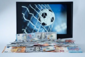 Football Goals and Betting Coins on Computer