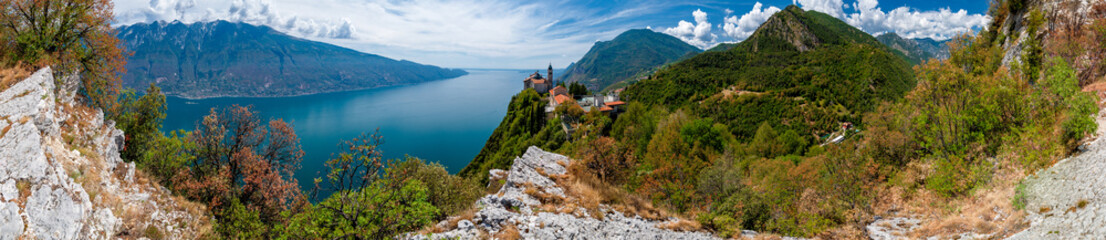 Lake Garda (Lago di Garda) with Pilgrimage church Madonna di Montecastello in the mountains near...