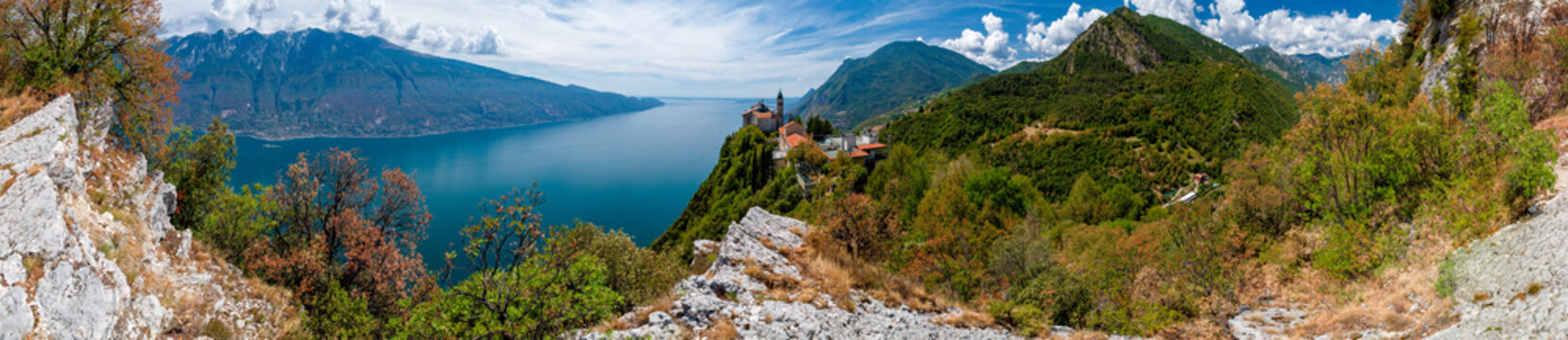 Lake Garda (Lago di Garda) with Pilgrimage church Madonna di Montecastello in the mountains near Tignale in Italy