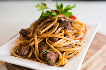 Tallarines con lomo saltado noodles with sauted meat peruvian gourmet restaurant food