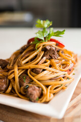 Tallarines con lomo saltado noodles with sauted meat peruvian gourmet restaurant food