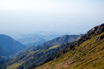 mountain landscape and fog below .view from the top of the mountain