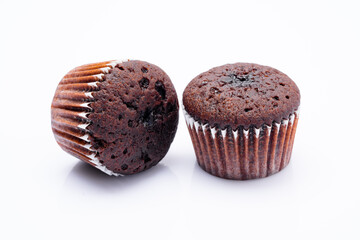 Chocolate cupcakes and blueberries on the vintage background