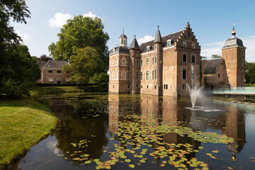 Fototapeta na wymiar Castle Ruurlo surrounded by a water moat near the village of Ruurlo in the province of Gelderland; the Netherlands.