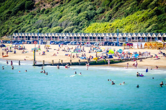 August 24, 2022, Boscombe Beach, Bournemouth, United Kingdom - People on the beach in a very hot summer day, England