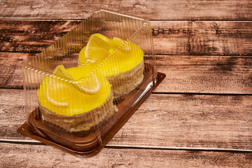 small cake in a transparent box for sale in stores